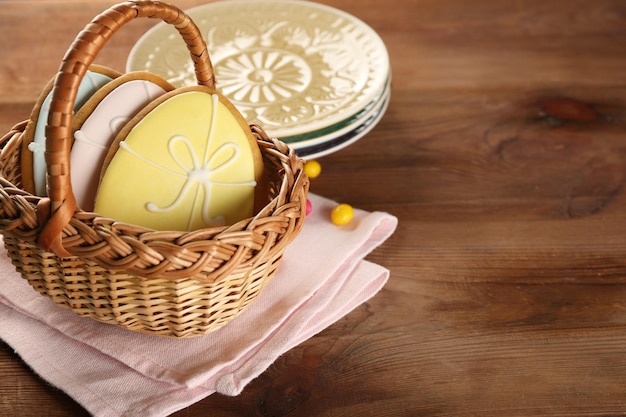 Creative Easter sugar cookies in small decorative wicker basket