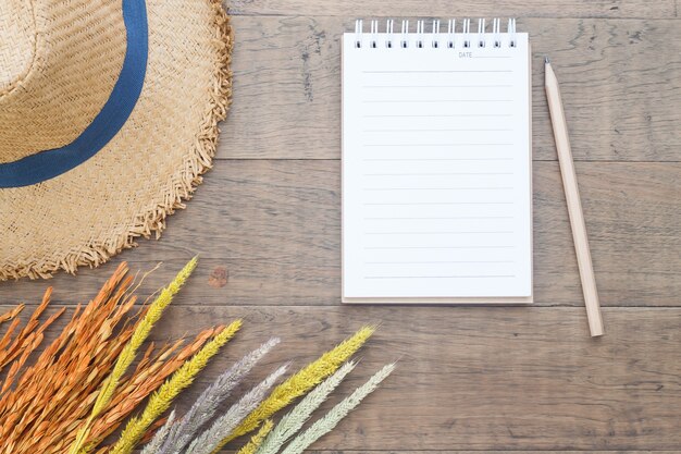 Creative flat lay of autumn concept on wood background