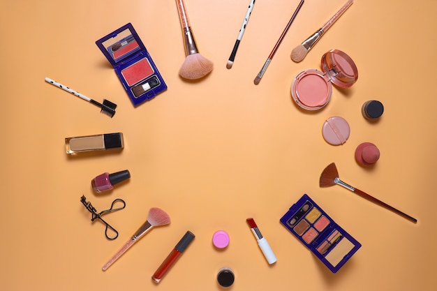 Creative flat lay composition of make up set with copy space