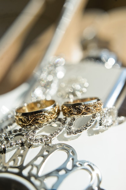 Creative gold wedding rings, close up.