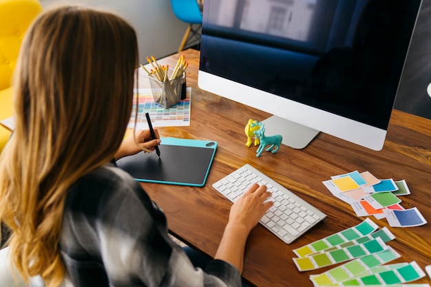 Creative graphic designer in front of computer