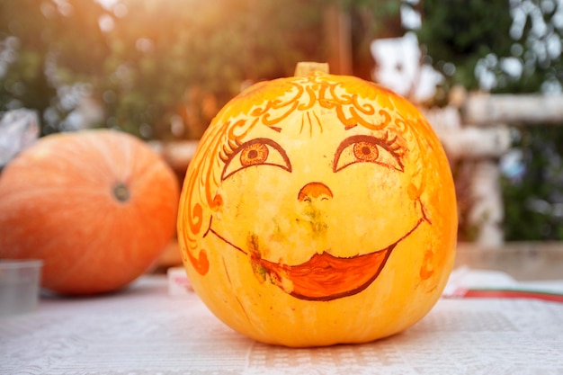 Creative halloween pumpkin with kind and cute makeup