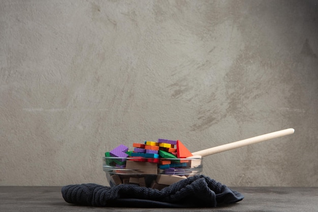 Creative idea concept wooden puzzle in bowl with spoon Develop new idea food for inspiration