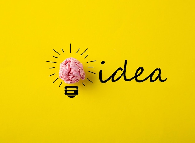 Creative idea Inspiration New idea and Innovation concept with Crumpled Paper light bulb