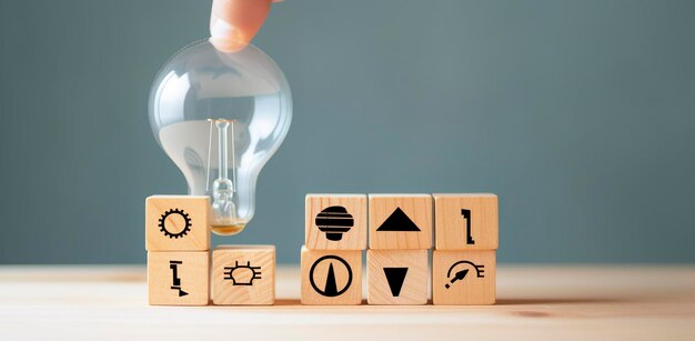 Creative idea solution and innovation concept Idea generation for business development Wooden cube blocks with light bulb and cycle icons on clean background and copy space AI Generative