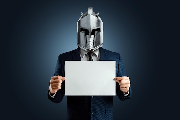 Creative image a man in a modern suit of a businessman a\
knight\'s helmet on his head armor the concept of a modern hero\
overcoming difficulties a crisis a good manager magazine style