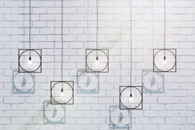 Creative lamps on brick wall