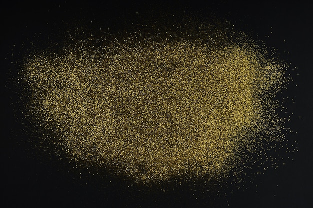 Creative layout made of golden glitter with copy space