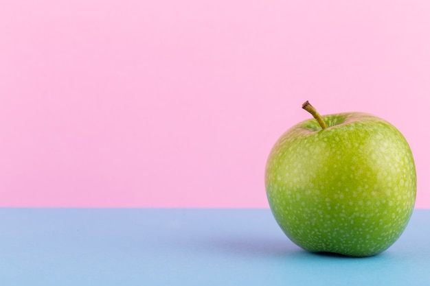 Creative layout made of green apples.