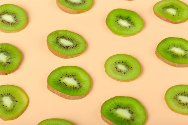 Photo creative layout made of kiwi fruits