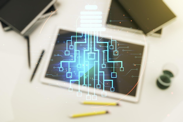 Creative light bulb with chip hologram and modern digital tablet on background artificial Intelligence and neural networks concept Multiexposure