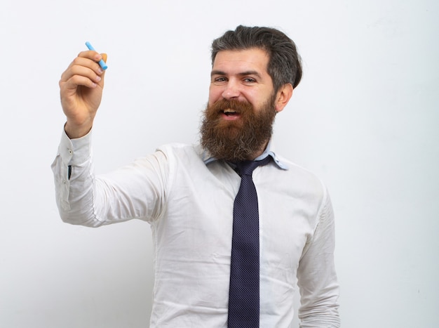 Creative man drawing, template. Man writing on a white wall mockup. Copy space.