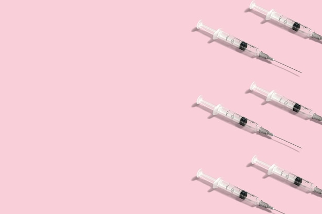 Creative medicinal pattern from syringes of background