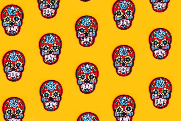 The creative pattern is made of Katrina's skull and a yellow background. Day of the Dead is a Mexican holiday