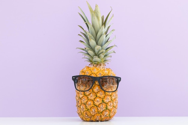 Creative pineapple with sunglasses isolated on color background
summer vacation beach