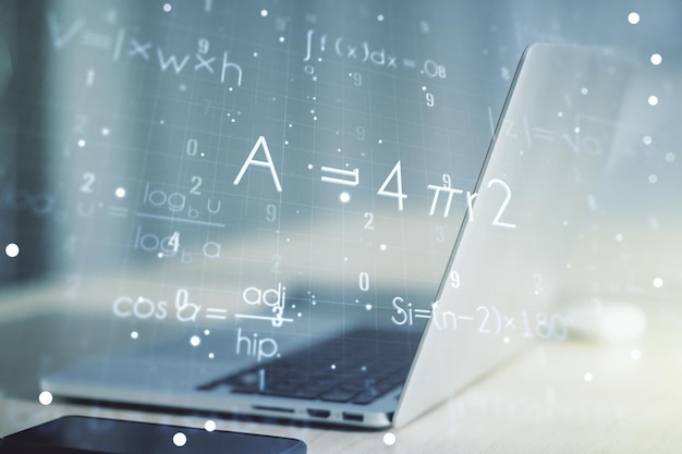 Creative scientific formula concept on modern laptop background Multiexposure