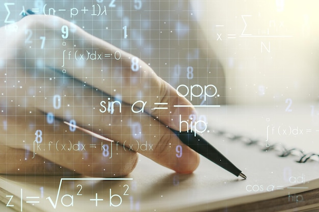 Creative scientific formula illustration with man hand writing in diary on background science and research concept Multiexposure