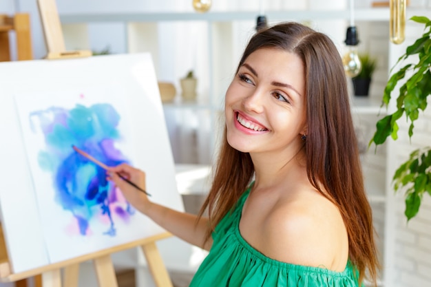 Creative woman working in art studio