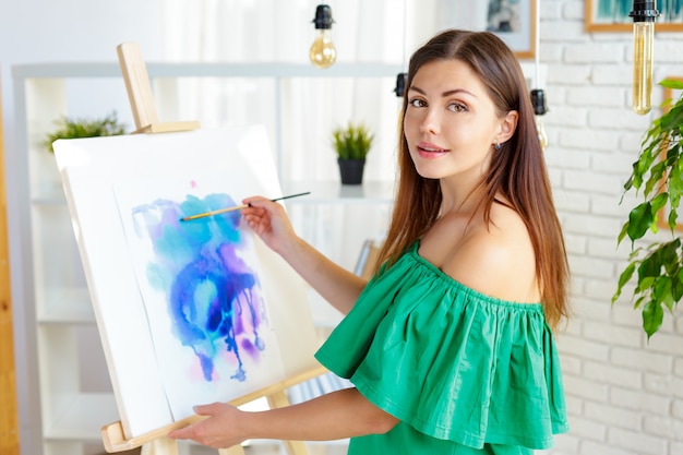 Creative woman working in art studio