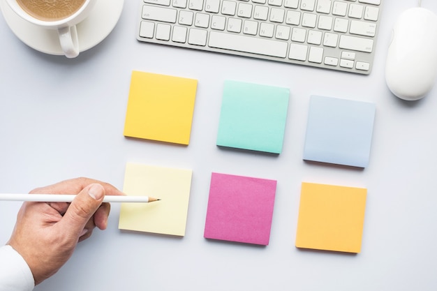 Creativity idea concepts with male hand using notepaper in white