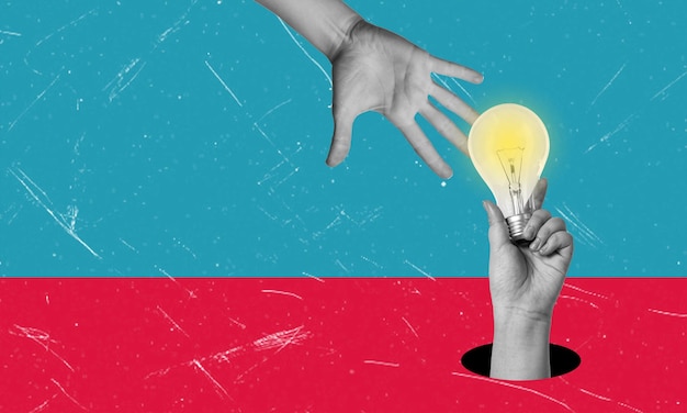 creativity and new ideas in business hand with a light bulb