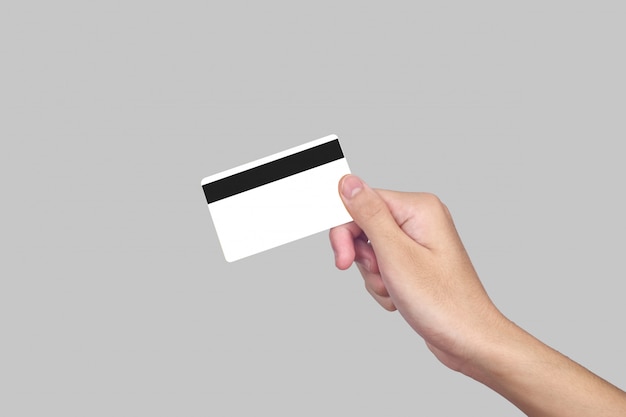 손에 신용 카드 또는 직불 카드