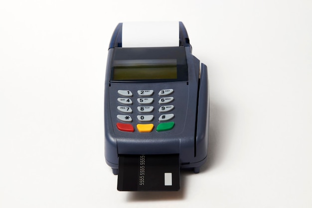 Photo credit card payment, buy and sell service. payment terminal and credit card on white background