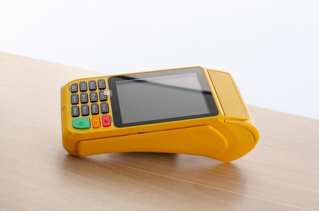 Credit card payment machinepos terminal and bank cardconcept of\
payments money purchases and credit