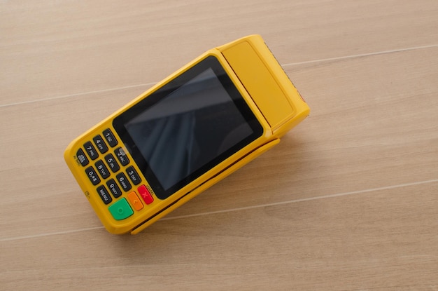 Credit card payment machinepos terminal and bank cardconcept of\
payments money purchases and credit