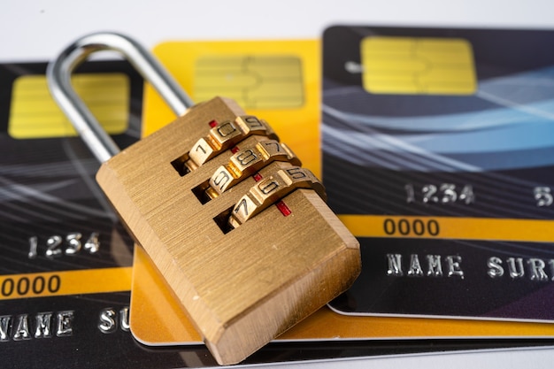 Credit card with password key lock isolated on white\
background.