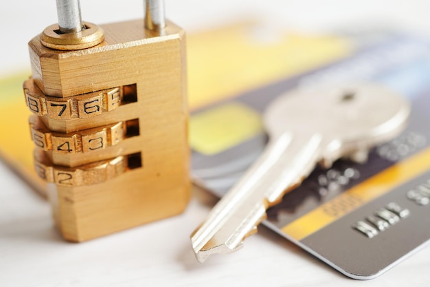 Credit card with password key lock security finance business concept