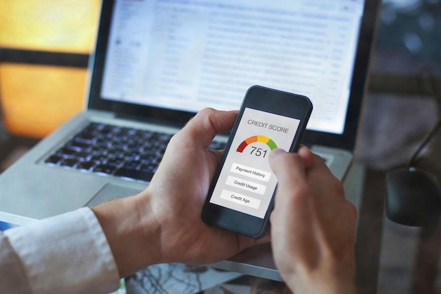 credit score concept on the screen of smartphone checking payment history and ranking in bank