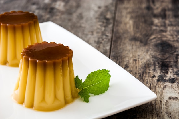 Creme caramel Egg pudding on wooden table