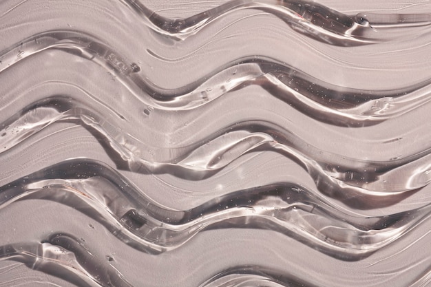 Crème gel grijs transparant cosmetische monster textuur golven achtergrond