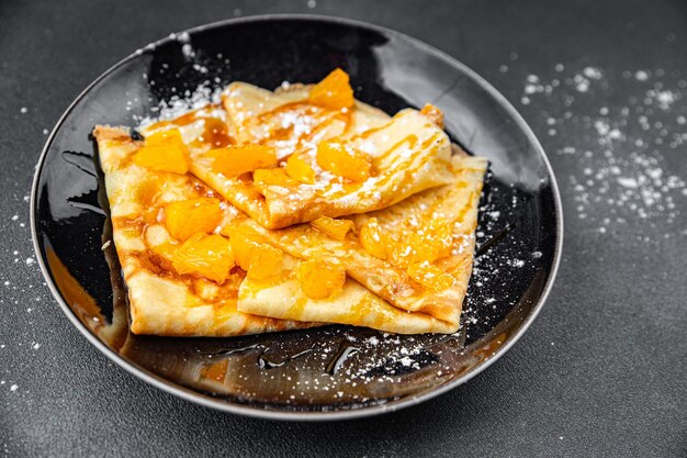 Crepe sweet pancake orange fruit syrup fresh dessert eating cooking appetizer meal food snack