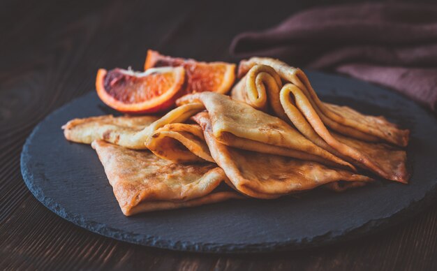 Crepes Suzette on the stone board