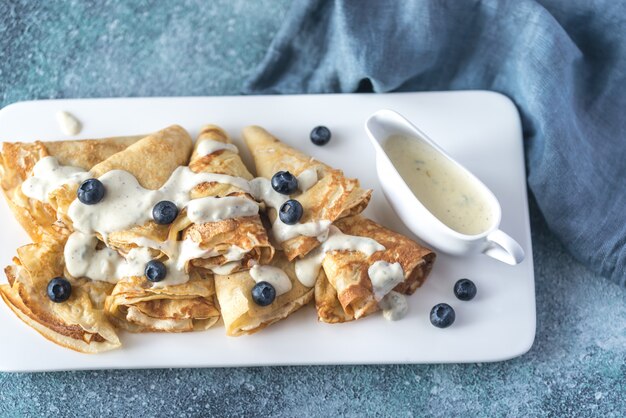 Crepes with blue cheese sauce