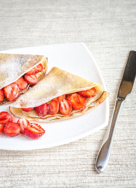 Crepes with fresh strawberries