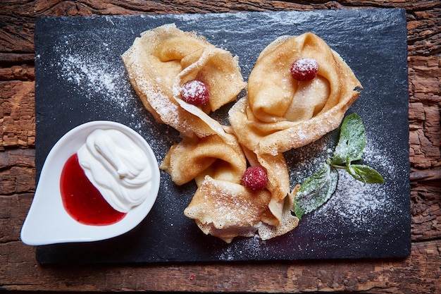 Crepes with raspberries