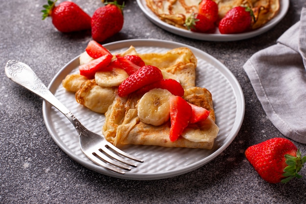 Crepes with strawberry and banana