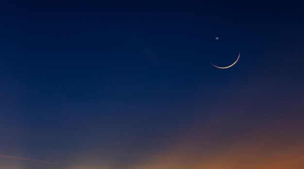 Premium Photo | Crescent moon in the evening with dark blue hour sky  twilight background well editing text