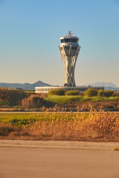 Crete airport, control tower across empty airfileld