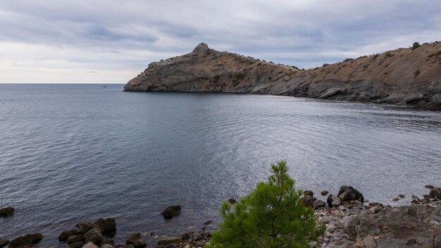 Crimean Black Sea coast landscape sea mountains and sky the concept of travel and tourism