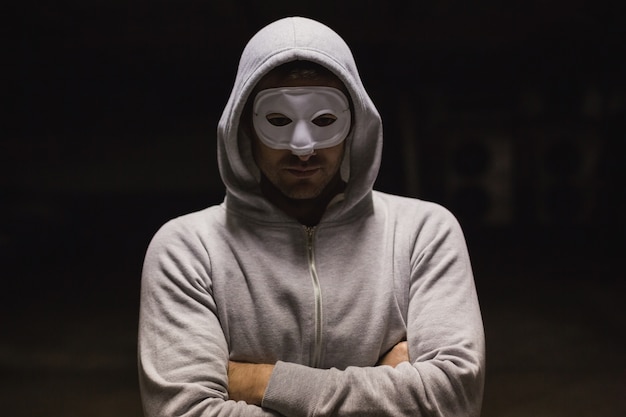 Criminal in mask looking at camera 