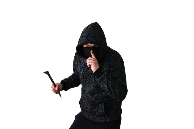 Criminal with crowbar isolated on white background. Robber in dark hoodie. .