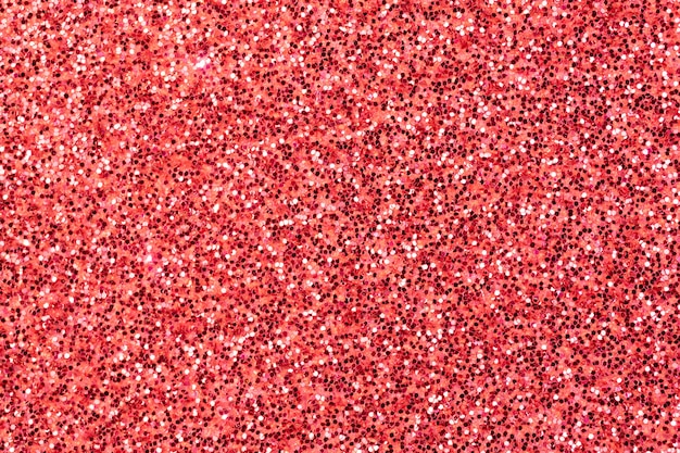 crimson glitter texture background, glitter or sandpapper high detailed surface, shining glowing effects concept photo