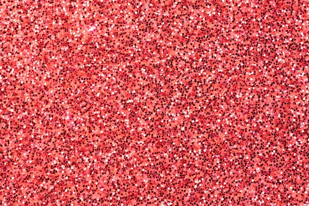 Crimson glitter texture background, glitter or sandpapper high detailed surface, shining glowing effects concept photo