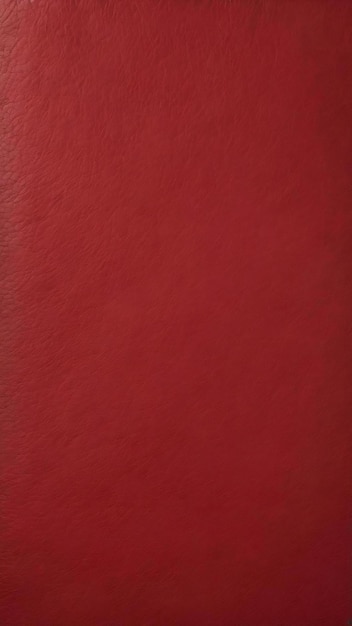 Crimson red textured smooth leather surface background small grain