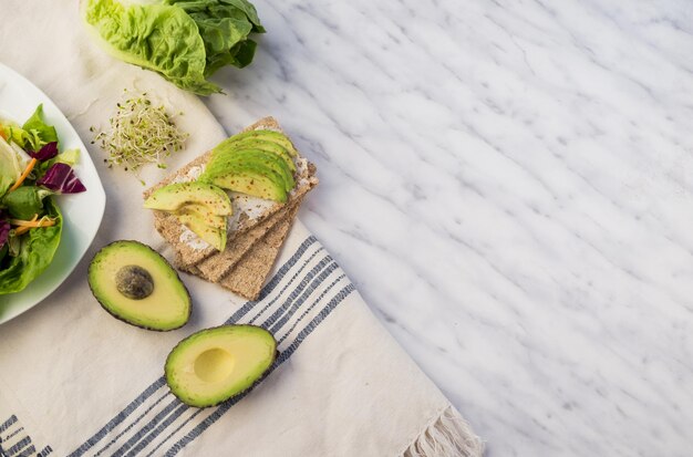crisp bread with avocado table High quality and resolution beautiful photo concept