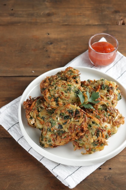 Crispy Bakwan Sayur or heci BalaBala or Vegetables Fritter Indonesian snack with carrot cabbage